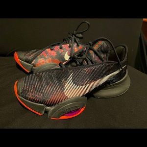 Black and red  Nike sneakers perfect condition used  2 times.